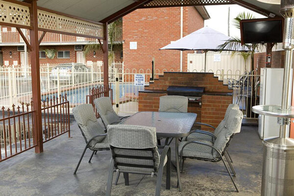 BBQ facilities next to the pool at the Courtyard Motor Inn, Shepparton, VIC