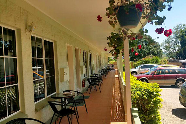 Patio, veranda and parking outside your room at Yungaburra Park Motel, Yungaburra, QLD